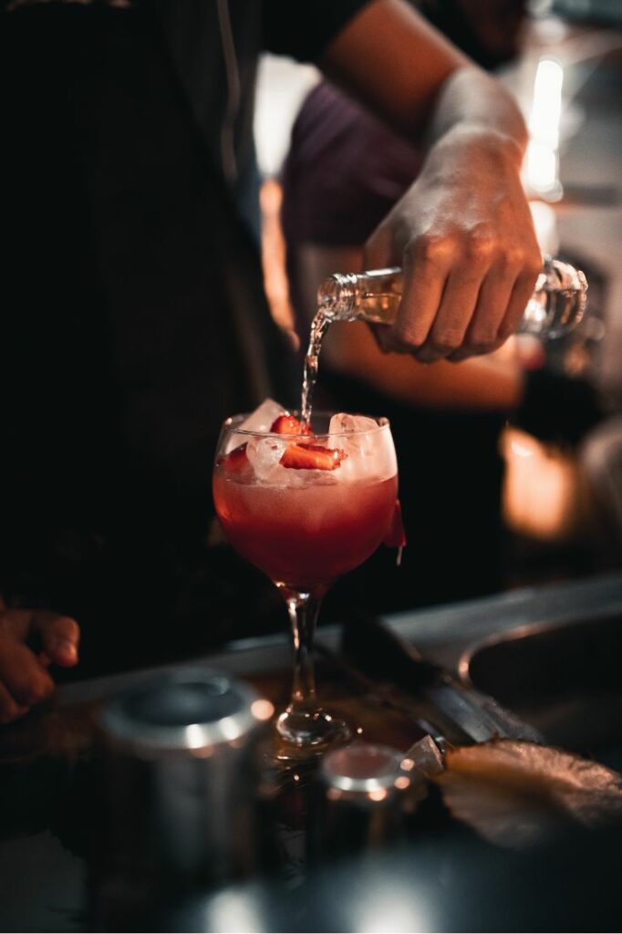 pouring a cocktail